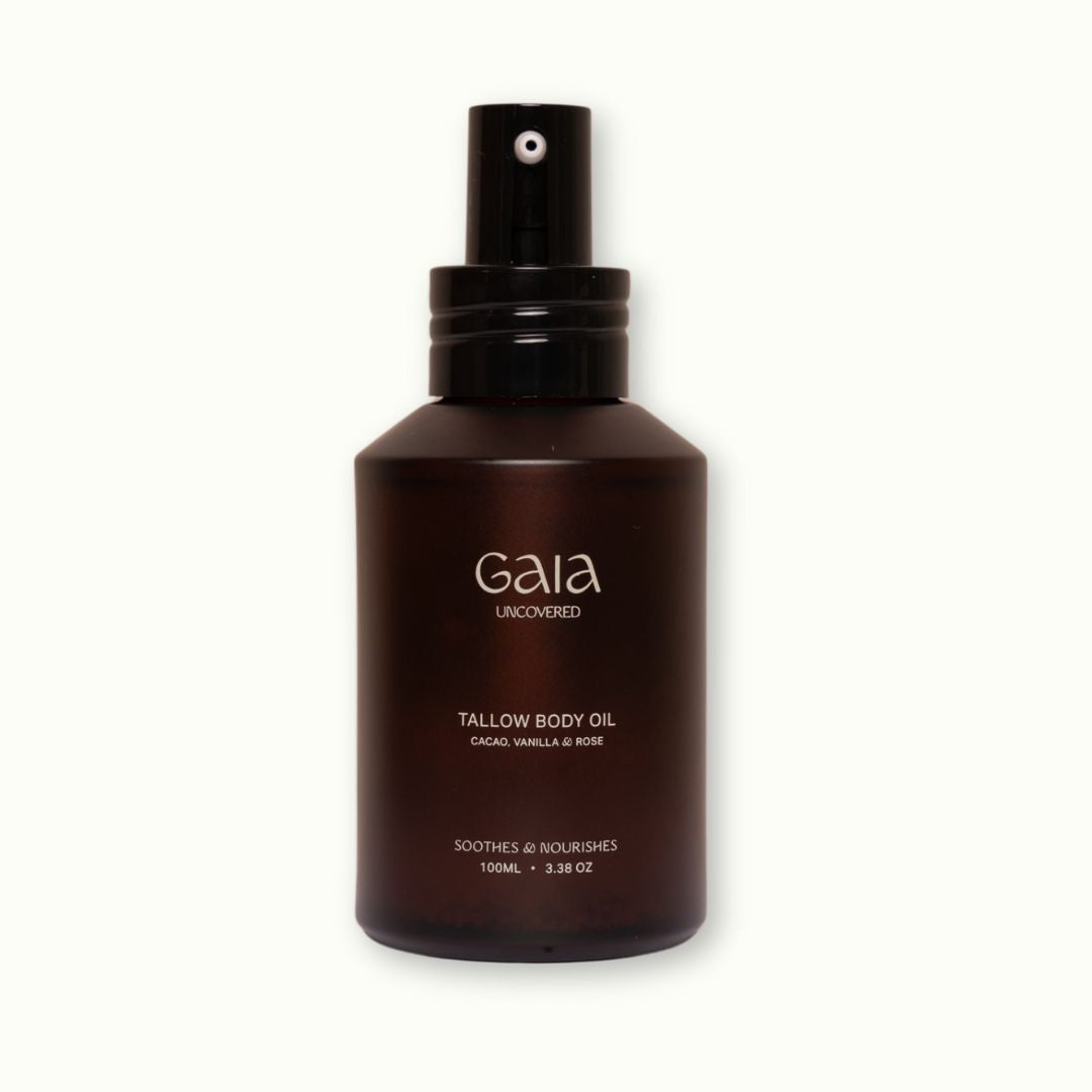 Brown bottle of Gaia Uncovered Tallow Body Oil on a white background